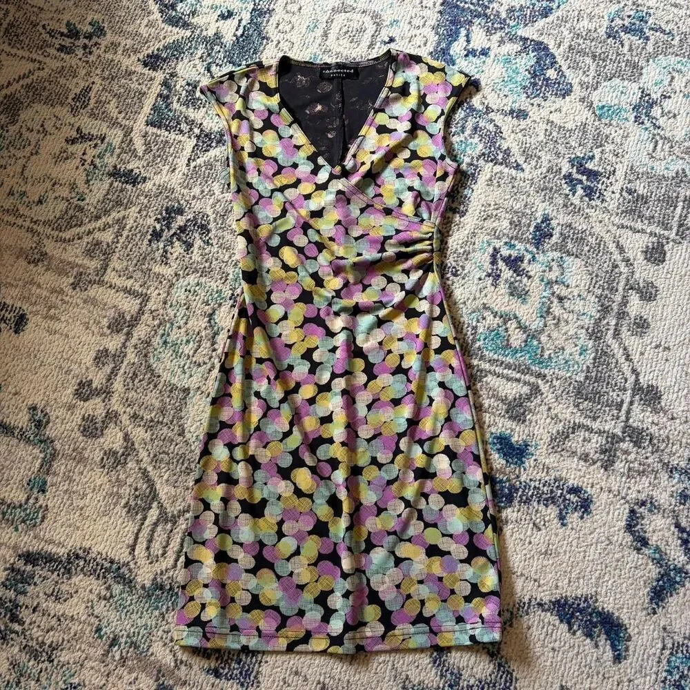 Connected multicoloured polka dot dress with a tie waist.‎ Size: S